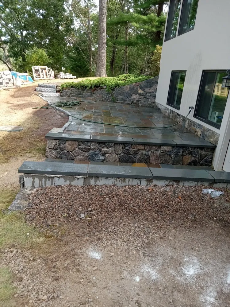 Custom landscape installation in Richmond, RI by C&M Landscaping