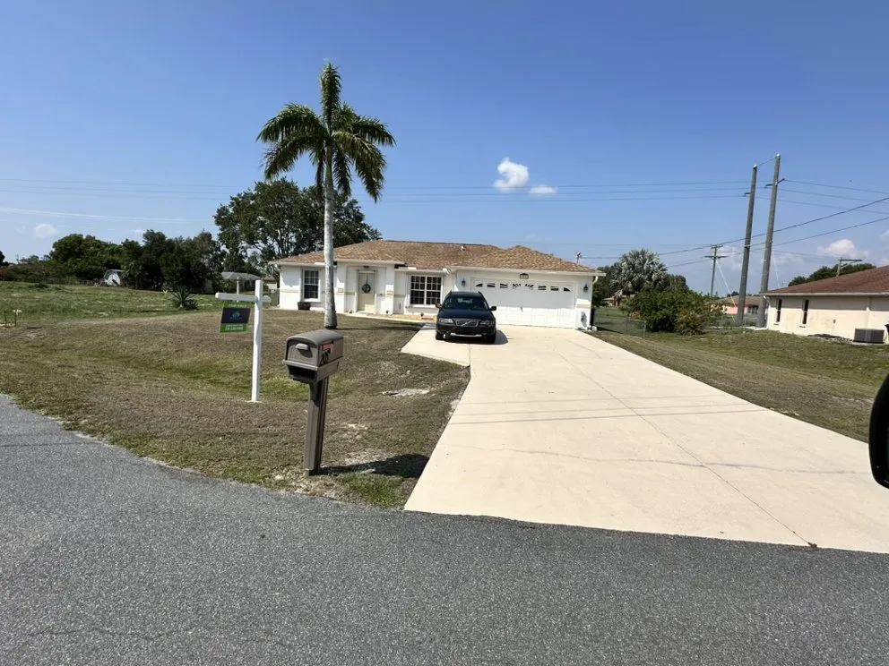Local garden landscaping for residential properties in Lehigh Acres, FL by CNA Lawn Care & Landscaping