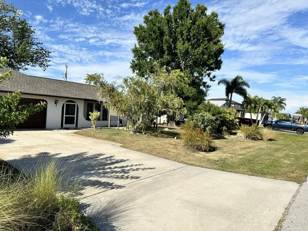 Reliable yard cleanup service in Lehigh Acres, FL by CNA Lawn Care & Landscaping