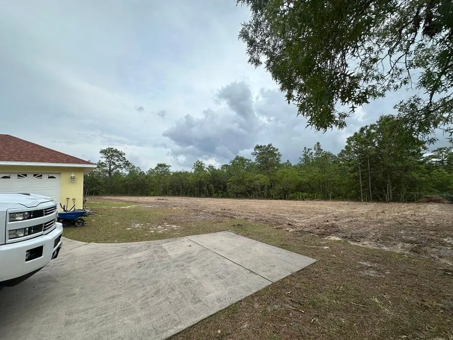 Professional lawn mowing service for outdoor upgrades across Dunnellon, FL - CNC Tractor