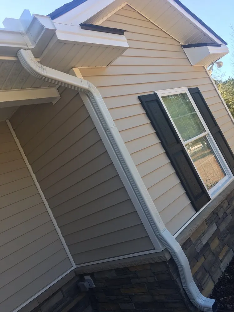 Professional yard maintenance for year-round maintenance in Brunswick, GA by Coastal Gutters