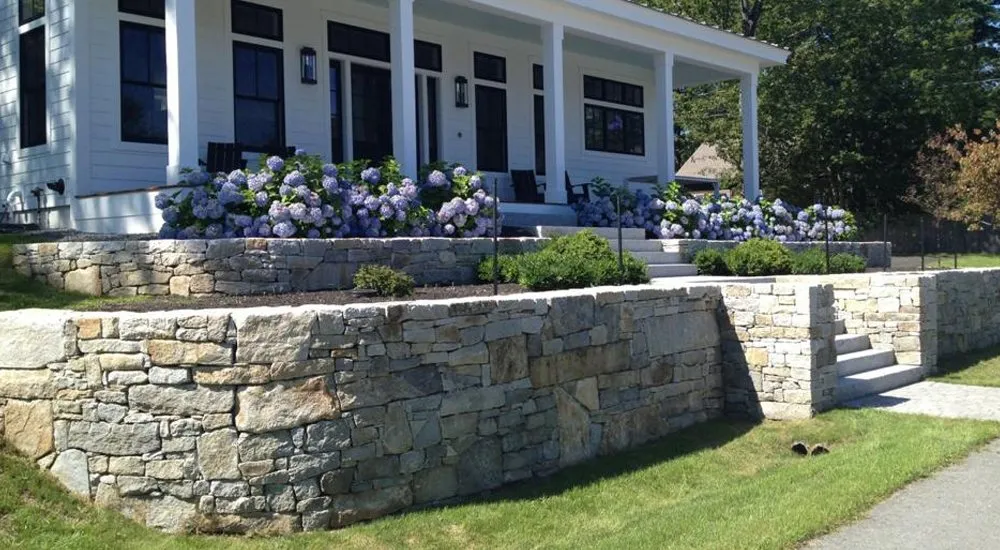 Local lawn mowing service for year-round maintenance in Cumberland, ME by Coastal Landscaping