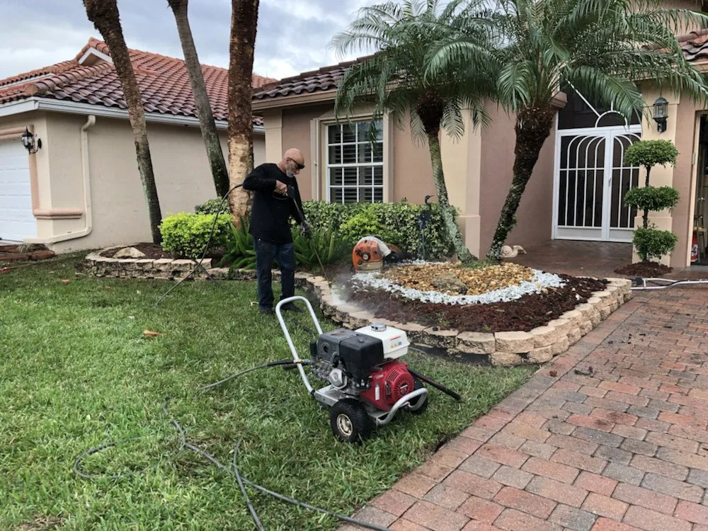 Professional yard cleanup service near you in Boca Raton, FL by Coastal Lawn