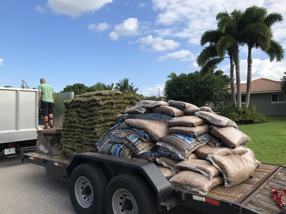 Custom landscape installation in Boca Raton, FL by Coastal Lawn