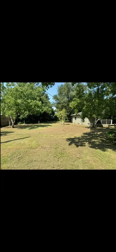 Professional landscape installation with custom design in Moss Point, MS by Coastal Lawn Services