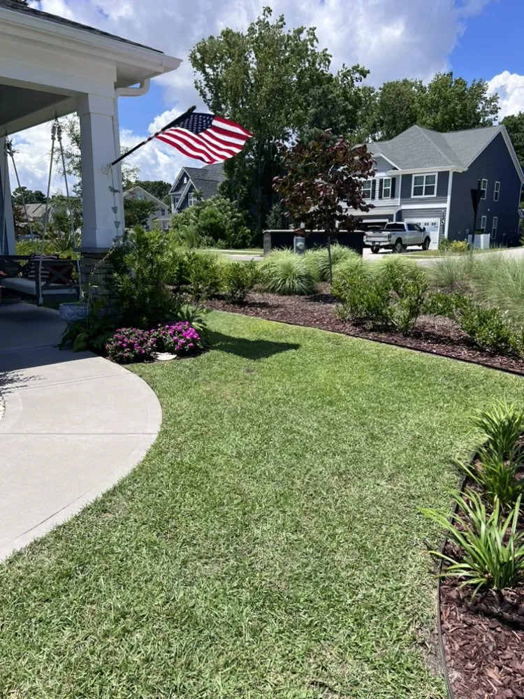 Custom yard maintenance for year-round maintenance in Wilmington, NC by Coastal Lawncare