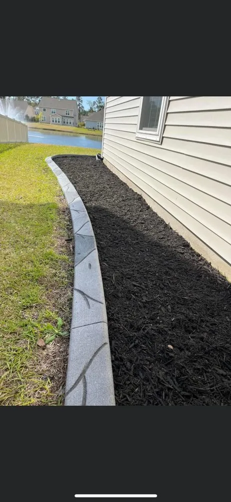 Affordable landscape installation for year-round maintenance in Myrtle Beach, SC by Coastal Palm Lawn Care