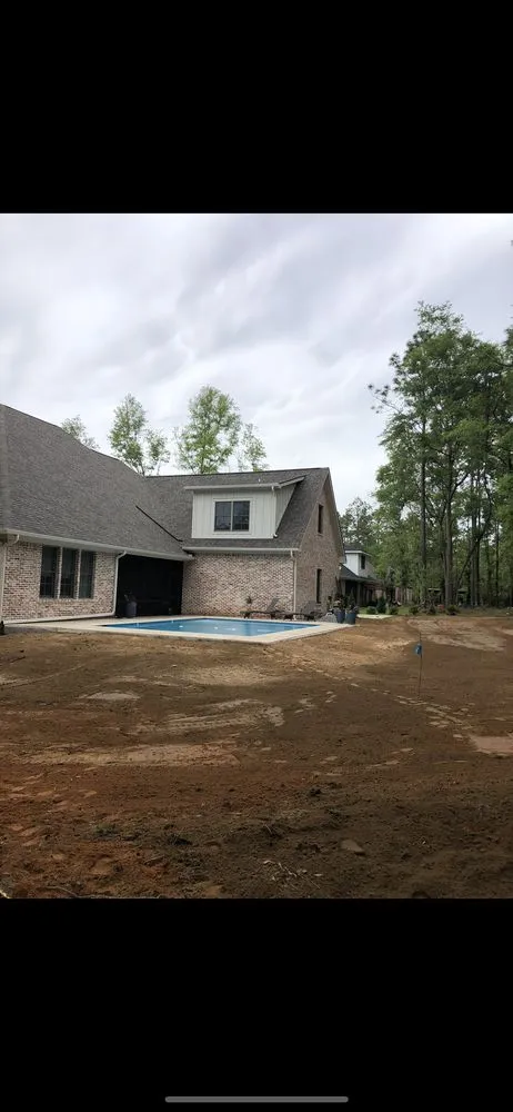 Custom landscape installation for beautiful yards in Fairhope, AL by Coastal Tree & Land Services