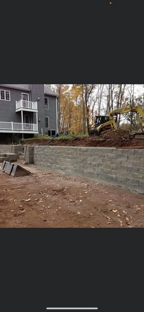 Custom outdoor landscaping for year-round maintenance in North Haven, CT by Coastal tree & landscaping