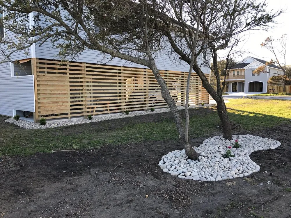 Custom outdoor landscaping for homes across Kill Devil Hills, NC - Coastal Turf Lawn & Landscape