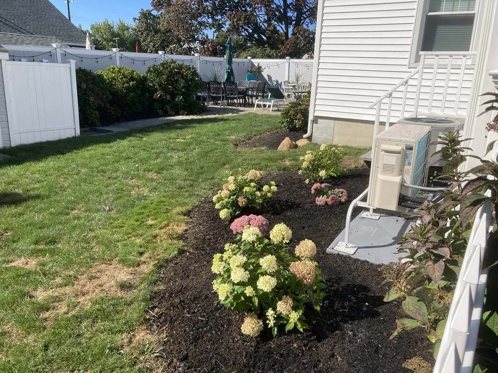 Reliable lawn care service for homes in Charlestown, RI by Coastline Landscapes