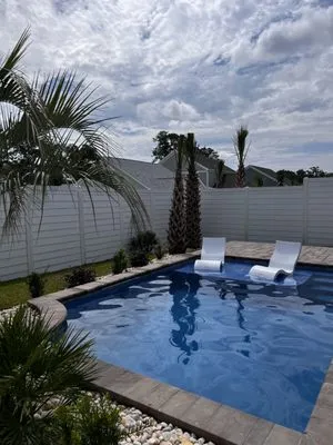 Coastline Pools And Spa Logo