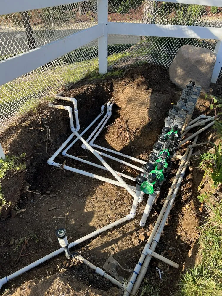 Professional lawn mowing service for outdoor upgrades in Fallbrook, CA by Cobra construction