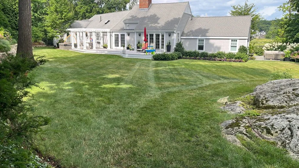 Top-rated lawn care service for year-round maintenance in Marshfield, MA by Coelho Landscaping