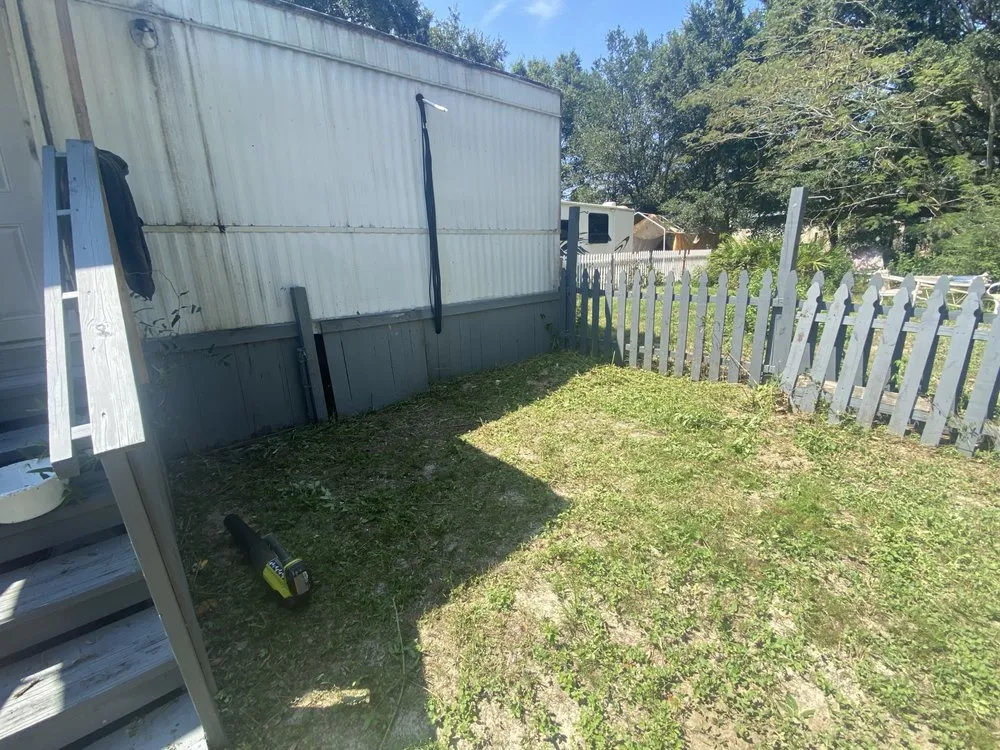 Professional lawn mowing service with custom design across Navarre, FL - Cole’s Cuts