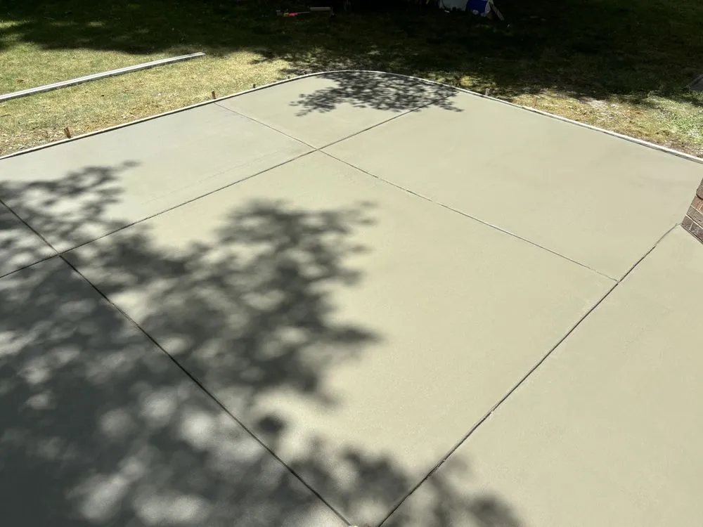 Professional lawn mowing service for year-round maintenance in Chesapeake, VA by Collins Concrete