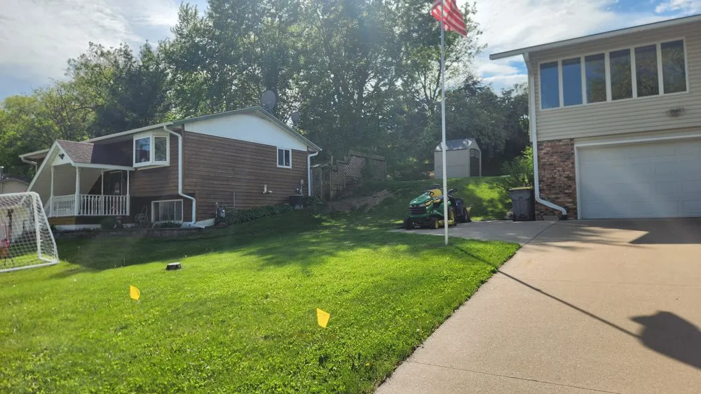 Custom yard cleanup service in La Crosse, WI by Collins Outdoor Services