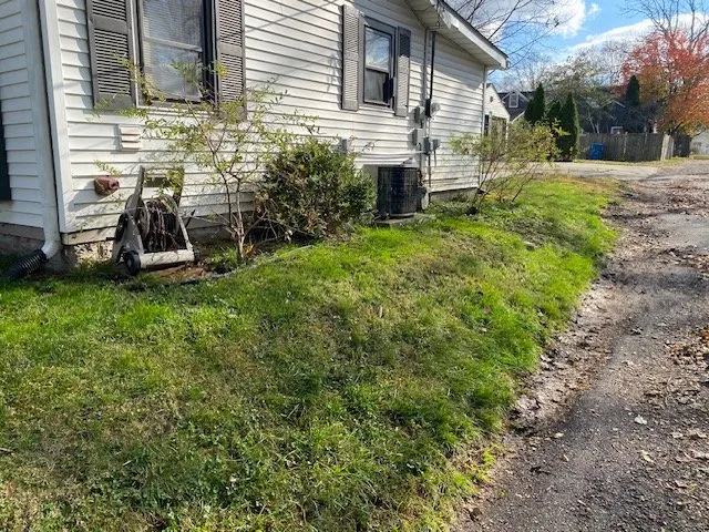 Affordable yard cleanup service for homes in Knightstown, IN by Collis Clean-Up & Construction