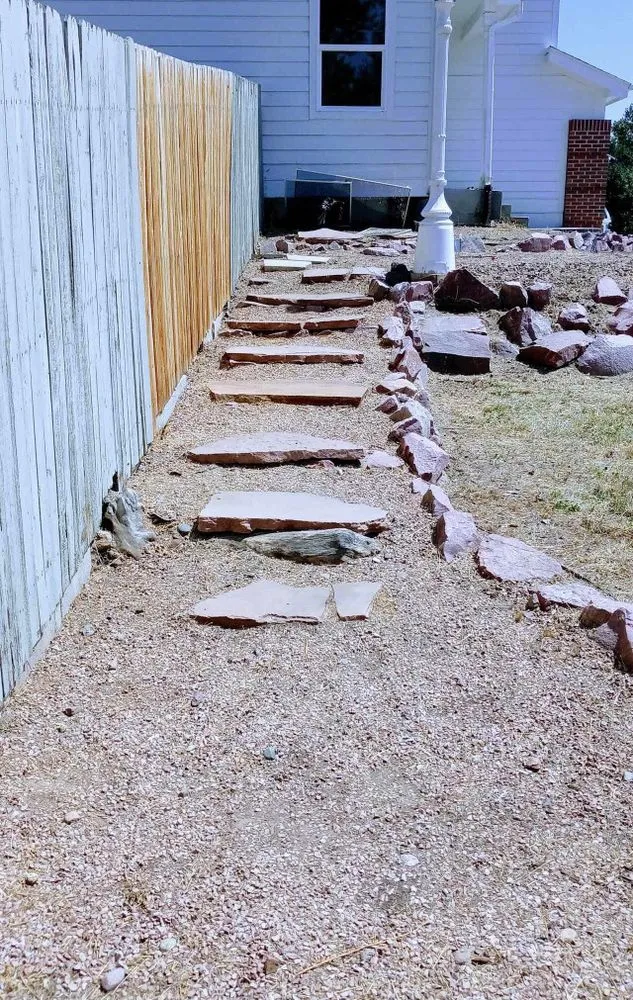 Custom yard cleanup service for year-round maintenance in Colorado Springs, CO by Colorado Own Landscaping
