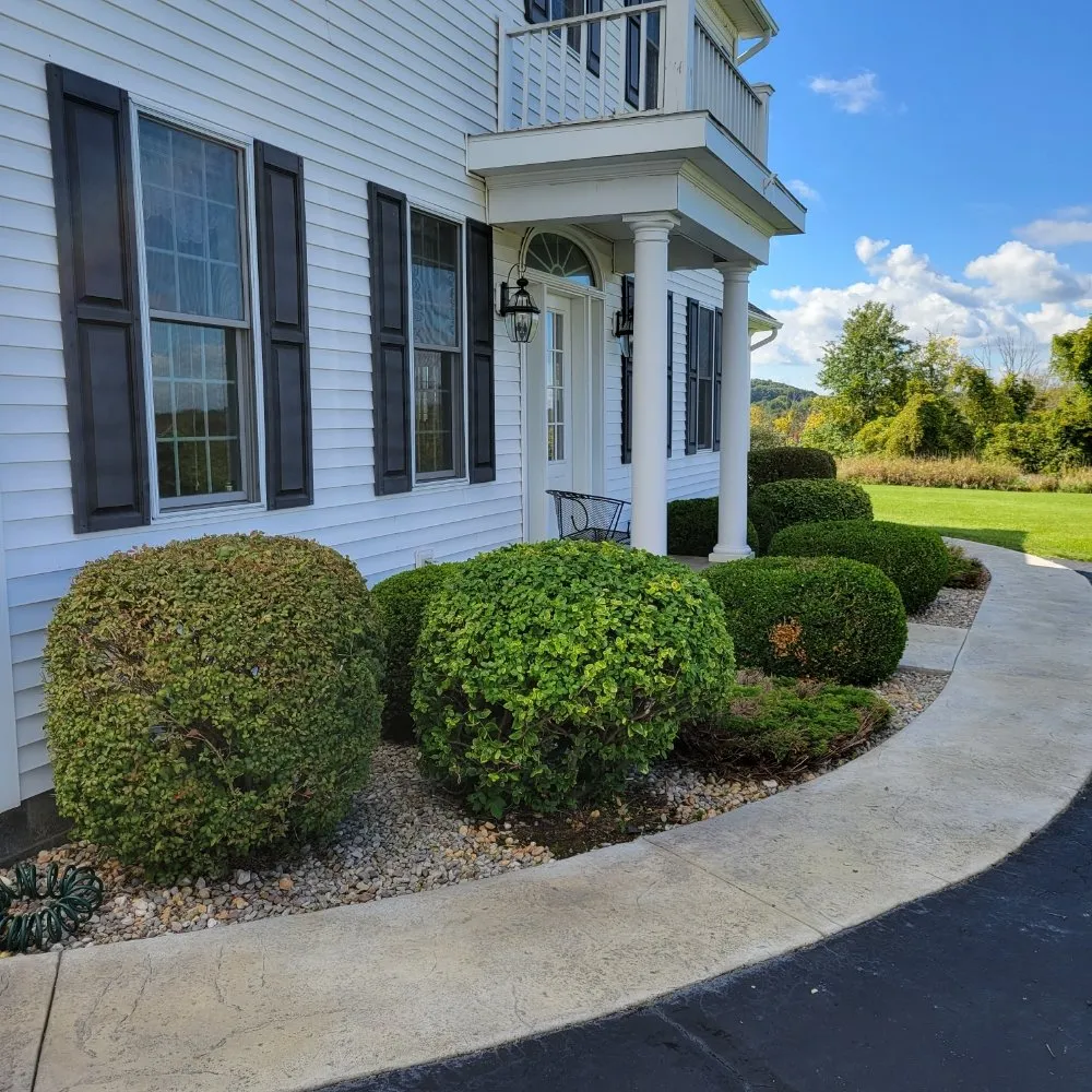 Top-rated lawn mowing service for year-round maintenance across Geneseo, NY - Colossal Landscaping