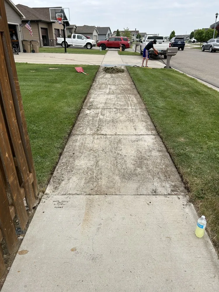 Professional landscape design for year-round maintenance in Minot, ND by Colton's Lawn Care