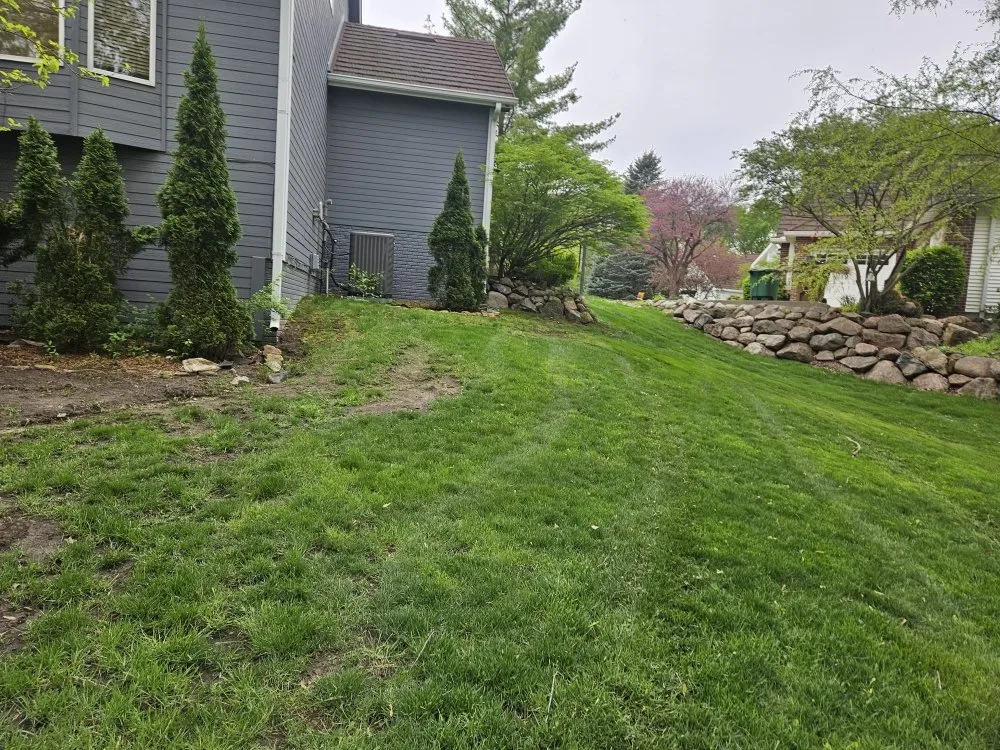 Custom lawn care service for year-round maintenance in Des Moines, IA by Colyn Lawn Care Services