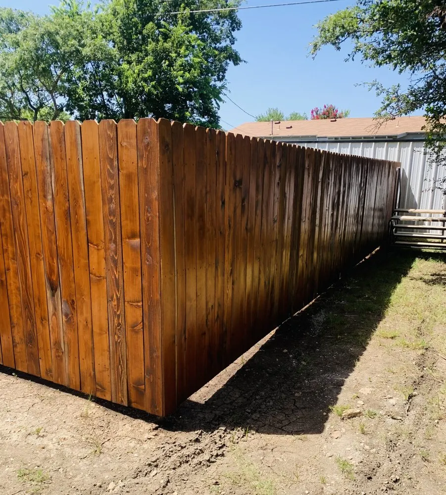 Custom landscape installation near you across Killeen, TX - Combat Muscle Fence and Stain