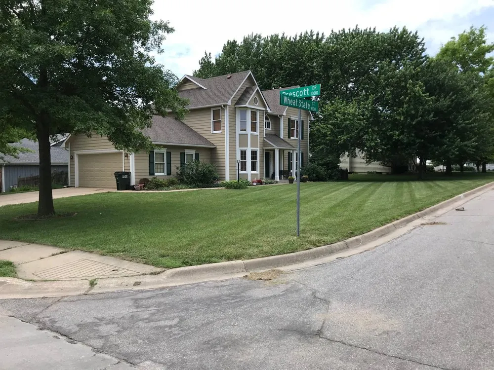 Affordable lawn care service with custom design in Lawrence, KS by Comfort Mowing and Lawncare