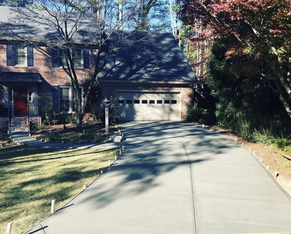 Custom lawn mowing service for beautiful yards across Woodstock, GA - Complete Concrete & Hardscapes