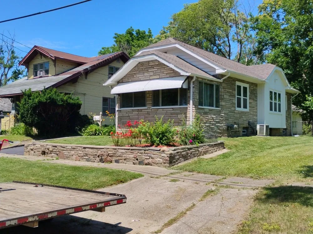 Local lawn care service for outdoor upgrades across Mount Morris, MI - Complete Elite Exteriors
