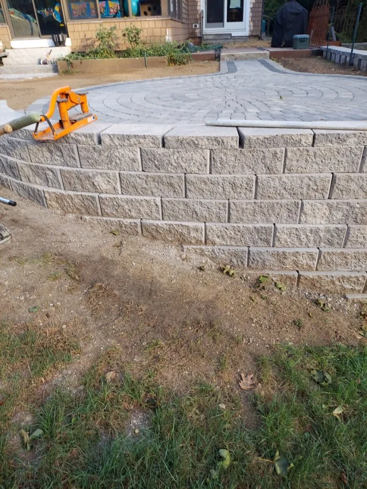 Custom landscape installation in Newton, NH by Complete Landscape and Irrigation