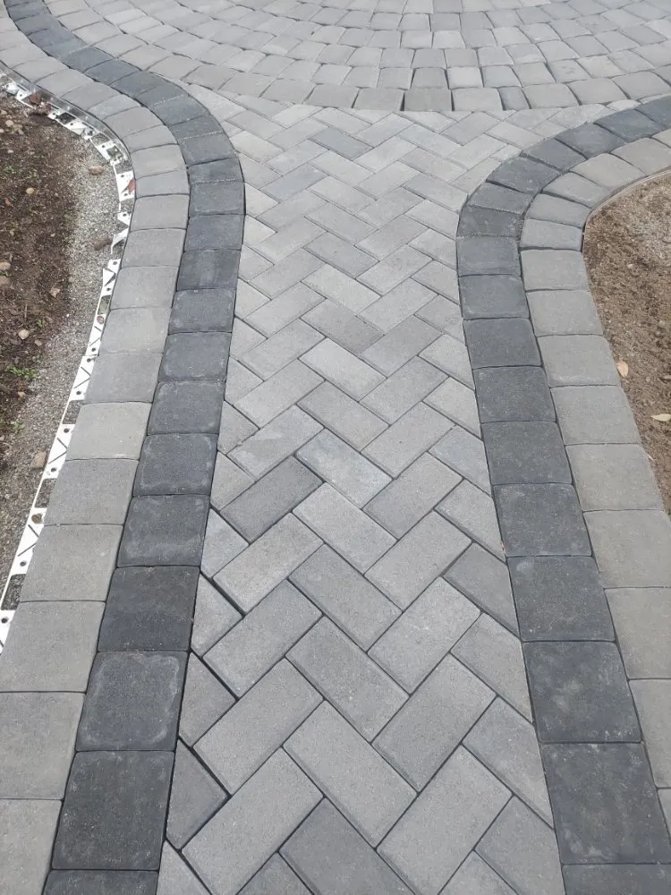 Custom outdoor landscaping for year-round maintenance across Newton, NH - Complete Landscape and Irrigation