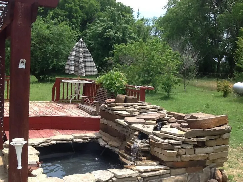 Professional landscape design for residential properties in Waxahachie, TX by Complete Landscape Solutions
