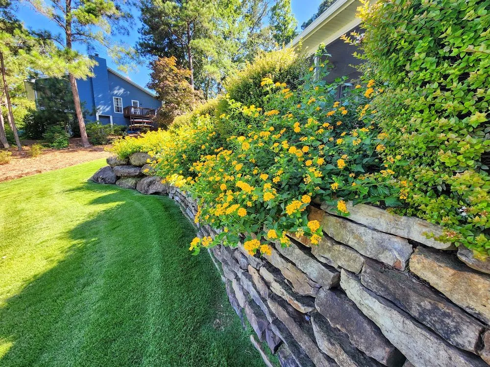 Custom lawn mowing service for year-round maintenance across Dadeville, AL - Complete Landscaping Solutions