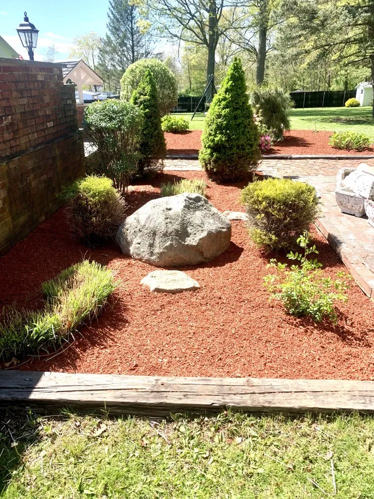 Custom landscape installation for homes in Rehoboth, MA by Complete Pools and Landscaping