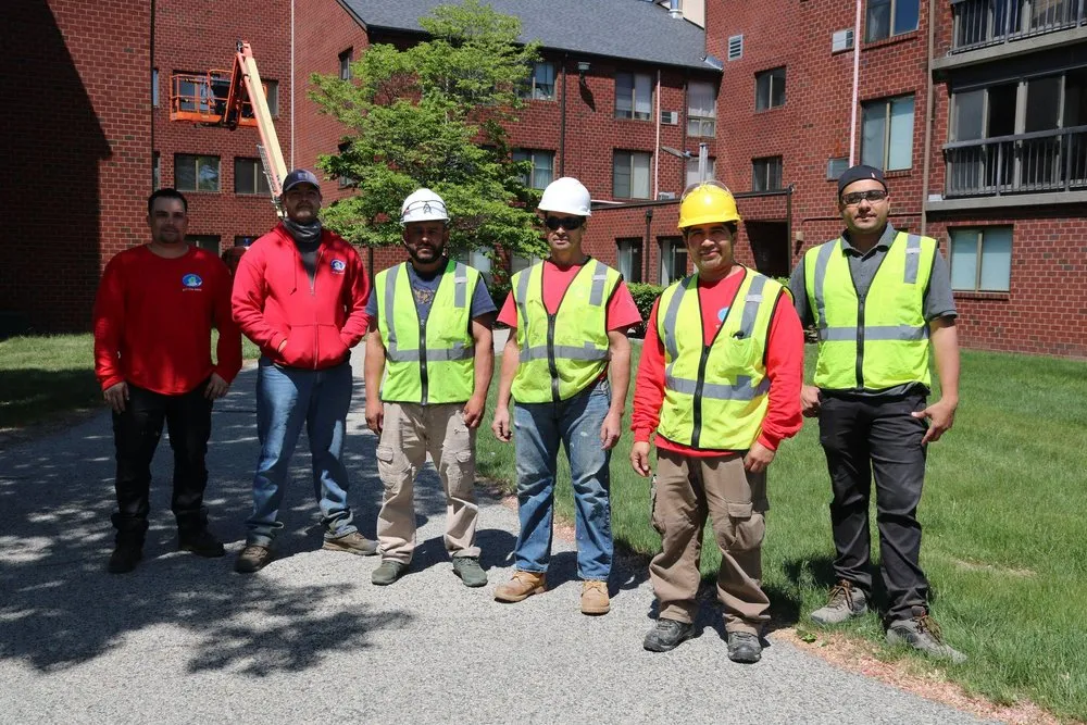 Custom landscape design for residential properties in Brookline, MA by Complete Property Care