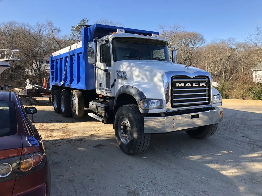 Reliable lawn mowing service for year-round maintenance in Selden, NY by Concept Design Contracting