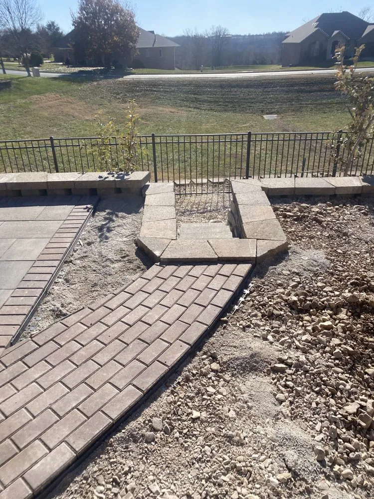 Custom yard cleanup service for year-round maintenance in Spokane, MO by Concepts Unlimited Landscaping