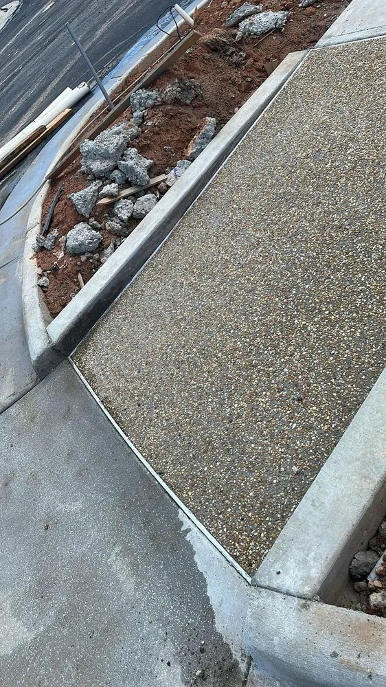 Reliable lawn care service near you in Asheboro, NC by Concrete J & R Service's