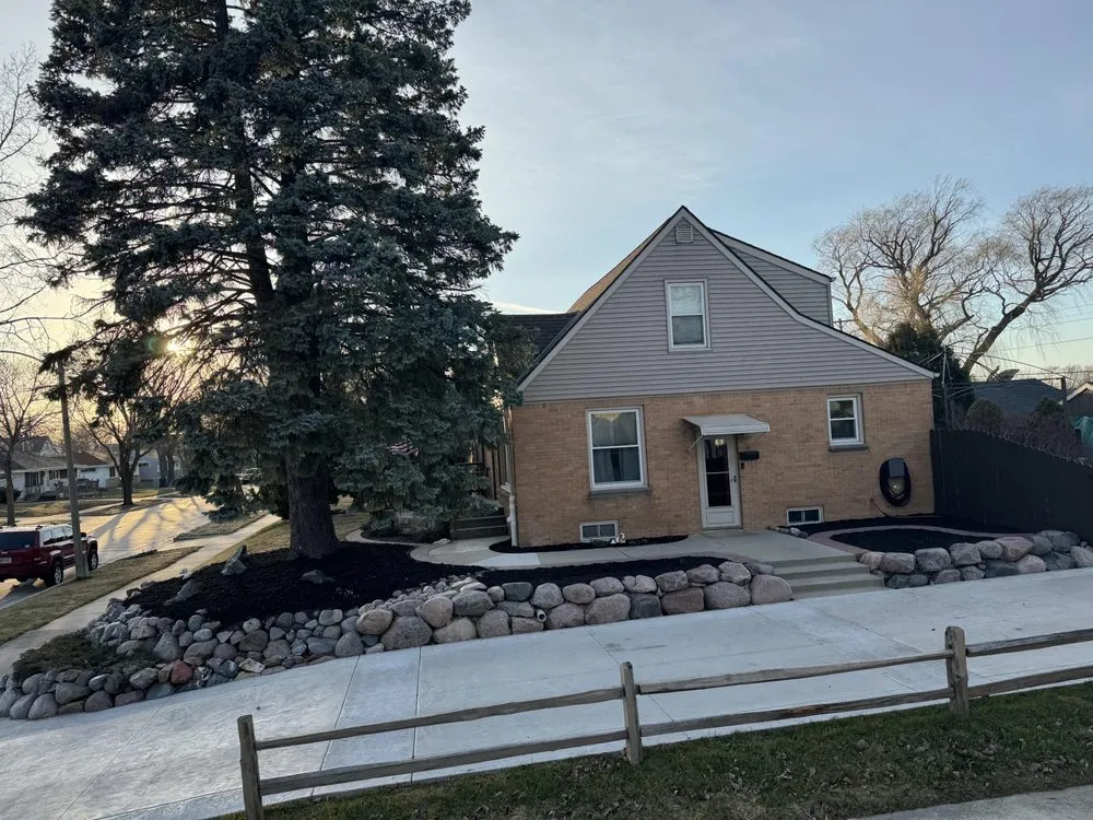 Expert yard maintenance for residential properties in Milwaukee, WI by Concrete Landscape Solutions