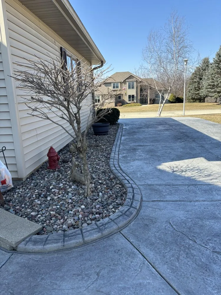 Reliable lawn care service with custom design in Milwaukee, WI by Concrete Landscape Solutions