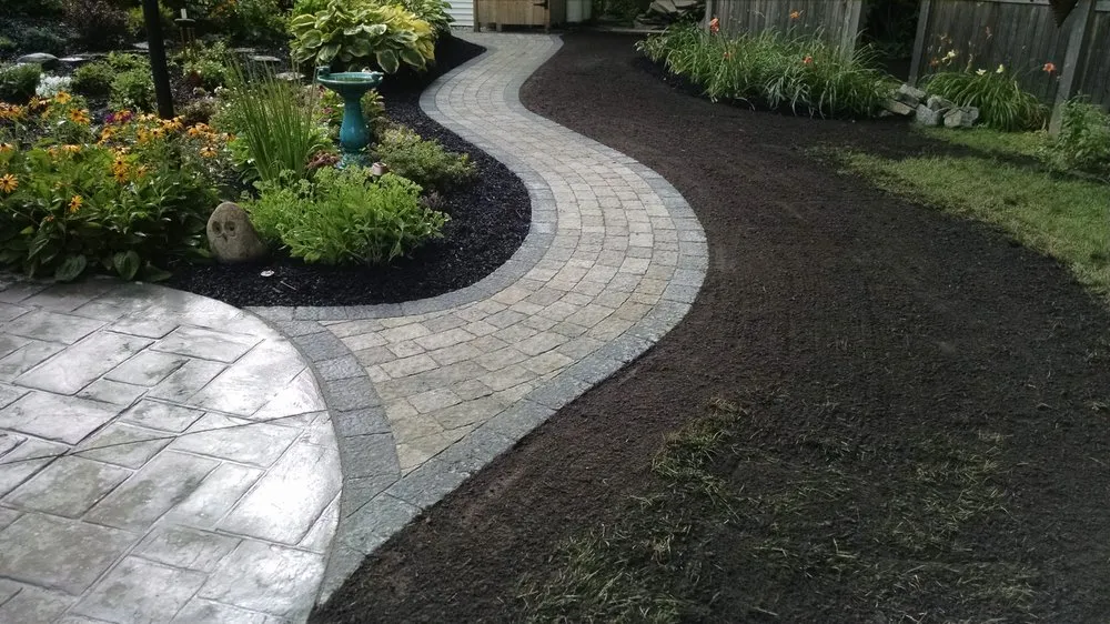 Affordable lawn mowing service for outdoor upgrades in Schenectady, NY by Contour Landscaping