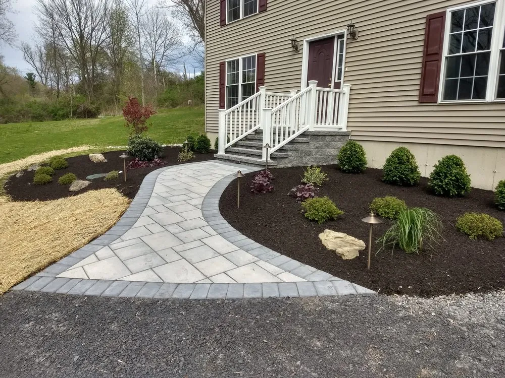 Local lawn care service for homes in Schenectady, NY by Contour Landscaping