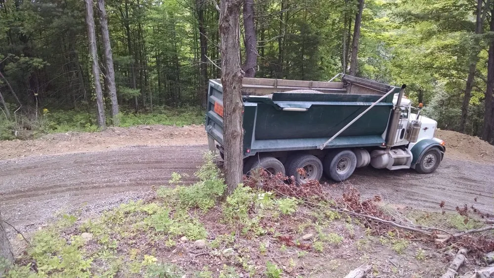 Affordable lawn mowing service for homes in Schenectady, NY by Contour Landscaping