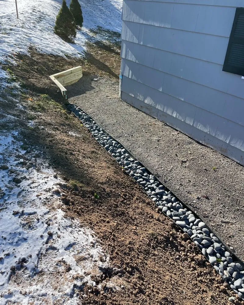 Reliable lawn care service for year-round maintenance in Honeoye Falls, NY by Cook Outdoor Contracting