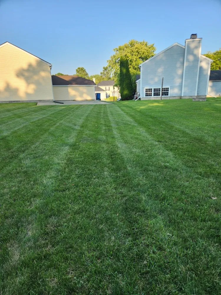 Reliable lawn mowing service in Lawrence, IN by Coopers Landscaping