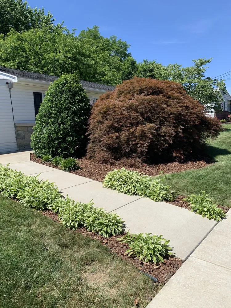 Custom landscaping services for beautiful yards in Womelsdorf, PA by Cooper’s Lawn And Landscape