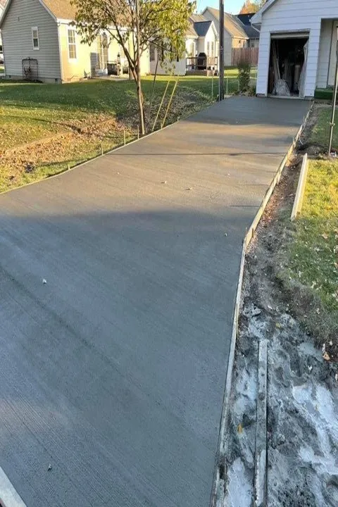 Professional landscape installation for year-round maintenance in Muncie, IN by Coops Lawn & Landscape