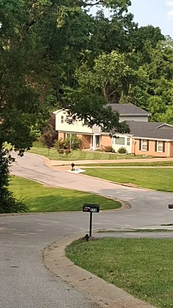 Professional landscape installation with custom design across Saint Louis, MO - Coops Lawn Care