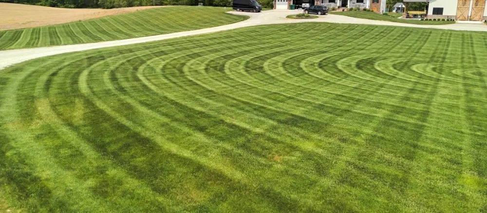 Custom lawn mowing service with custom design in Fort Wayne, IN by Coops-Touch